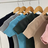 The Summer Of 2023, The New Korean Version Of Round Collar With Bottom-Fitting Bag And Middle-Length Knitted Dress With Buttocks-Outfit