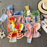 Design With Chic Kinescastic Striped One-Shoulder Sling Vest For Women Wearing A Short Coat Of