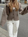 2025 Leisurely Pure Color V-Neck Knitted