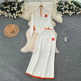 Simple Wind Bumpy Striped Knitted Sister Set With Long-Sleeved Sweater + High Waist Long Body Skirt