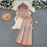 Simple Wind Bumpy Striped Knitted Sister Set With Long-Sleeved Sweater + High Waist Long Body Skirt