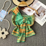Design With Chic Kinescastic Striped One-Shoulder Sling Vest For Women Wearing A Short Coat Of