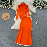 Simple Wind Bumpy Striped Knitted Sister Set With Long-Sleeved Sweater + High Waist Long Body Skirt